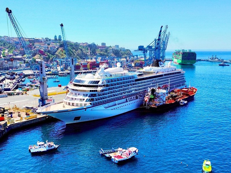 Two cruise ships berthed at Valparaiso with the hills of the city rising behind them
