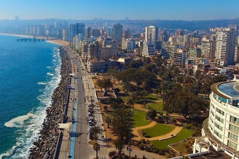 The long beach and apartment blocks of Vina del Mar curving away from a clifftop viewpoint